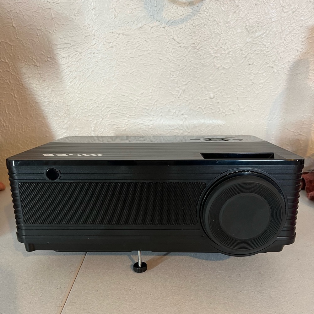 Projector with a screen